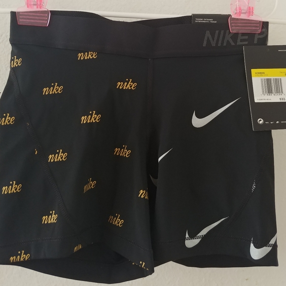 Nike Pants - SOLD Gold Black Nike shorts NWT